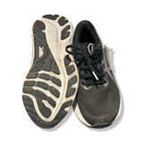 Svarta Asics FF Blast+ löparskor för dam i storlek 39, visade med sulan synlig mot vit bakgrund.