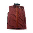 Red Houdini men's vest with zipper and chest pocket, front view against a white background.