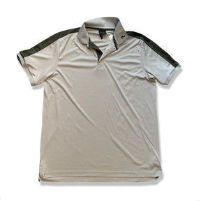 Beige Peak Performance Player Polo för herr med korta ärmar, fotograferad framifrån mot en vit bakgrund.