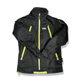 Black Helly Hansen children's ski jacket in size 152 with yellow zippers, front view against a white background.