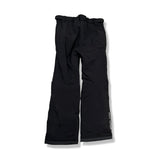 Back view of a pair of black children's ski pants from Helly Hansen against a white background.