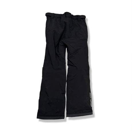 Back view of a pair of black children's ski pants from Helly Hansen against a white background.