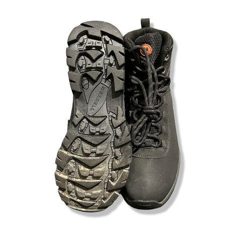 Underside and front view of black Merrell Vego Mid women's hiking boots against a white background.