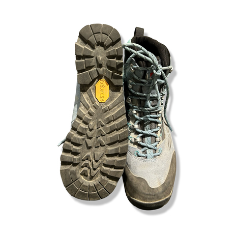 Underside and front view of a pair of blue/grey Kayland Legacy W's GTX women's hiking boots against a white background.