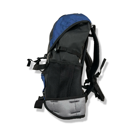 Blue and black Blackburn HydraPak unisex backpack, side view against a white background.