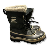 Dark green Sorel Caribou women's winter boots with wool lining, side view against a white background.