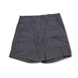 Dark grey Haglöfs Mid Hemp women's shorts with large front pockets, photographed against a white background.