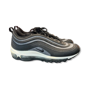 Women's Nike Air Max 97 sneakers in black and silver glitter, side view against a white background.