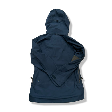 Back view of a blue Fjällräven Bergtagen Eco-Shell women's hooded shell jacket against a white background.