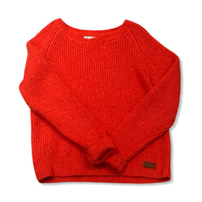 Pink knit women's Peak Performance sweatshirt, front view against a white background.