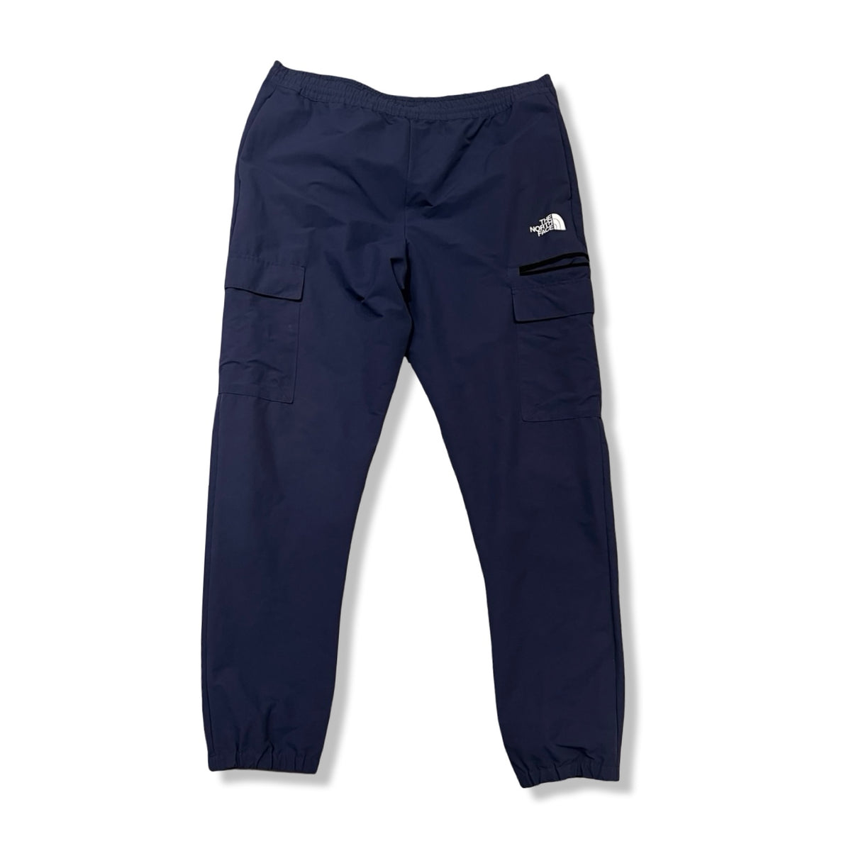 Blue The North Face men's activewear pants with pockets, front view against a white background.