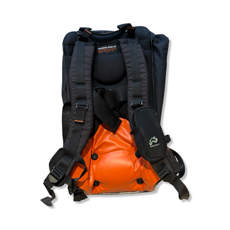 Boblbee GT 25L hardshell backpack in orange and black, rear view with padded straps against a white background.