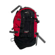 Black and red Haglöfs Tight Pro X Large backpack, front view against a white background.