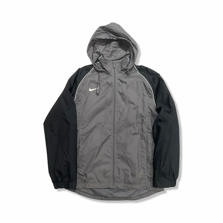 Grey and black Nike women's hooded windstopper jacket, front view against a white background.