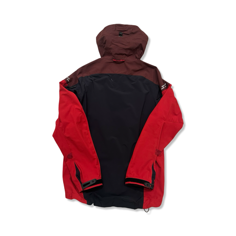 Back view of a red Lundhags Skomakarna AB men's hooded windstopper jacket against a white background.