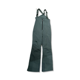 Green The North Face women's ski pants with suspenders, front view against a white background.