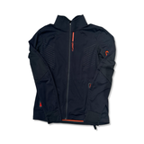 Black CRAFT men's functional jacket with a zipper and orange details, front view.