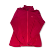 Women's Helly Hansen pink fleece jacket with a full zip and logo, front view against a white background.