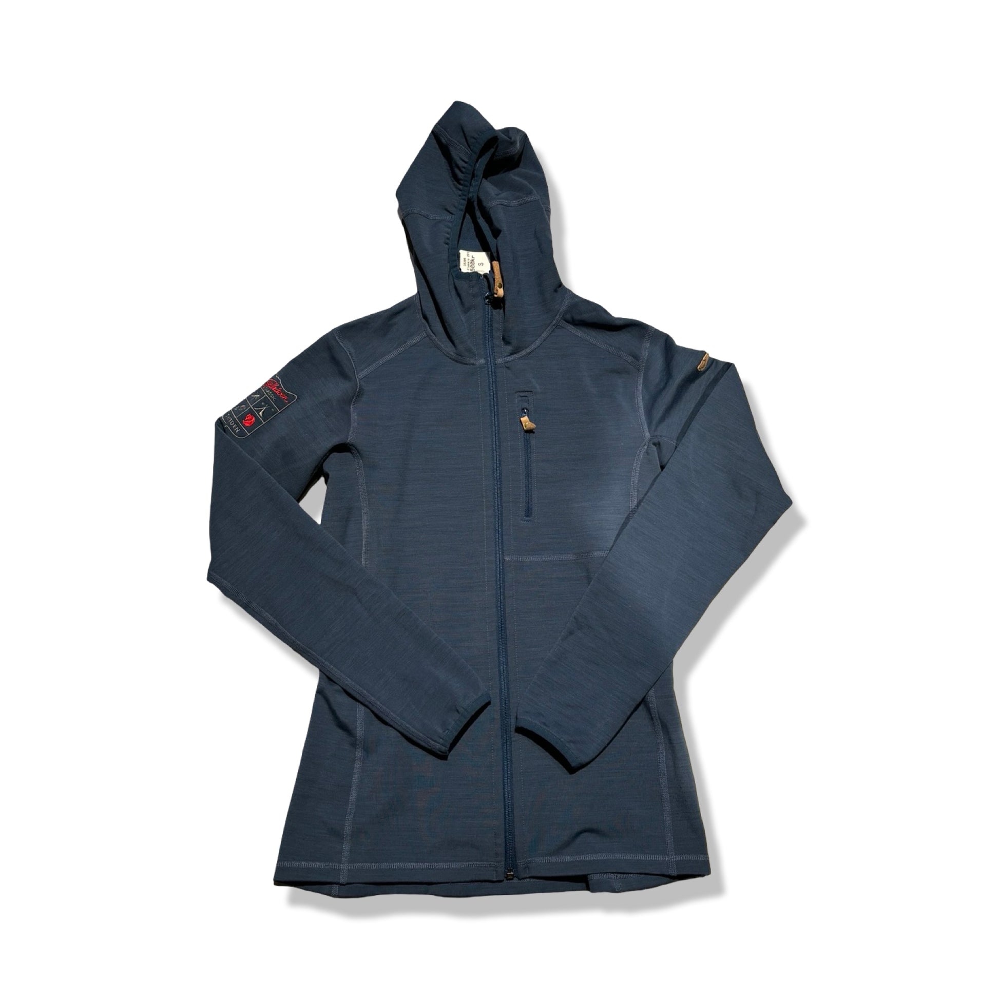 Fjällräven FJR fleecetröja för dam i blått, fotograferad framifrån mot en vit bakgrund.