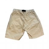 Peak Performance Ripstop Shorts för herr i cremevitt, sedda bakifrån med bakfickor och elastisk midja.