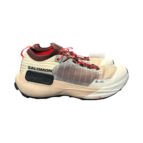 Salomon S/LAB Genesis löparskor för herr i vitt och rött, fotograferade från sidan mot en vit bakgrund.