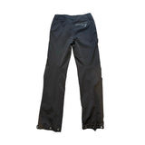 Svarta Houdini Motion Pants funktionsbyxor för herr, sedda bakifrån mot en vit bakgrund.
