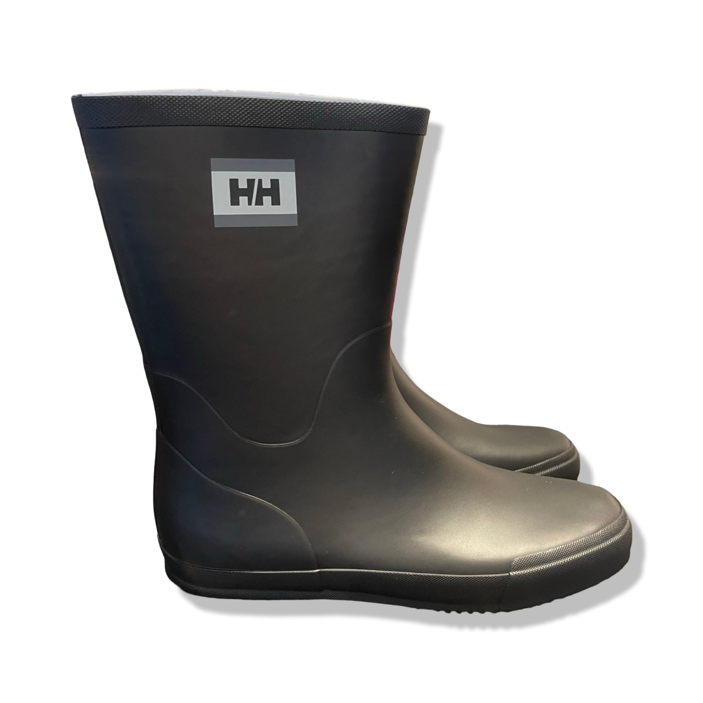 Helly Hansen Nordvik 2 gummistövlar för herr i mörkblått, fotograferade från sidan mot en vit bakgrund.