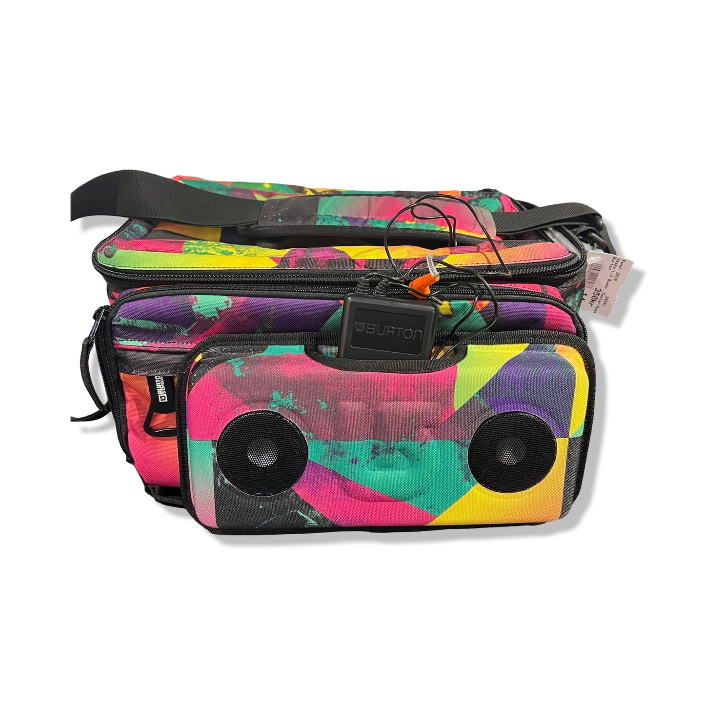 Burton Lil Buddy kylväska med högtalare i ett färgstarkt, grafiskt mönster. Väskan har en axelrem och en avtagbar framdel med två inbyggda högtalare, fotograferad framifrån mot en vit bakgrund.