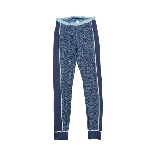 Ullmax Merino underställsbyxa för dam i blått med nordiskt mönster. Byxorna är fotograferade platt mot en vit bakgrund.