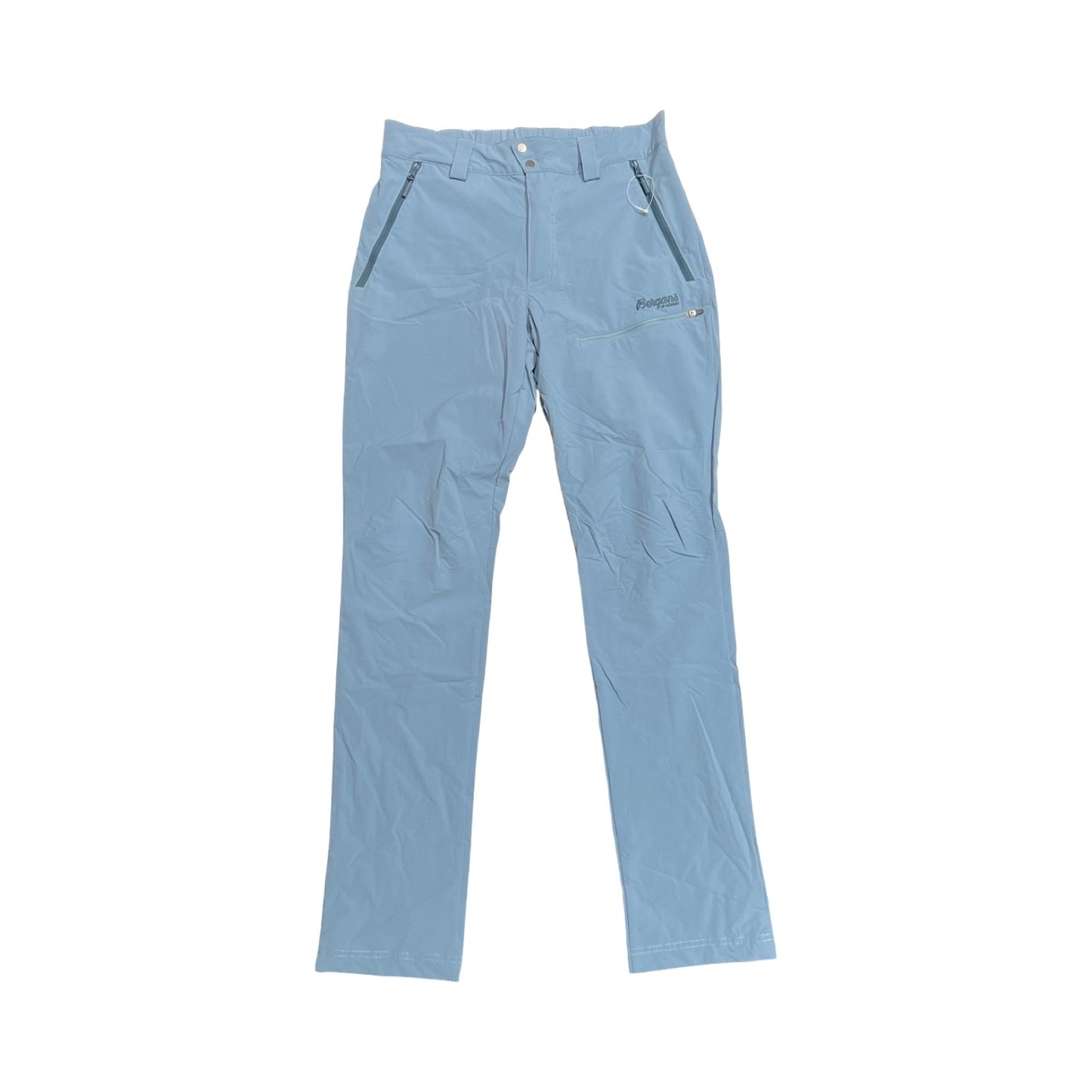 Bergans Tyin vandringsbyxa för dam i ljusblått, fotograferad platt framifrån mot en vit bakgrund.