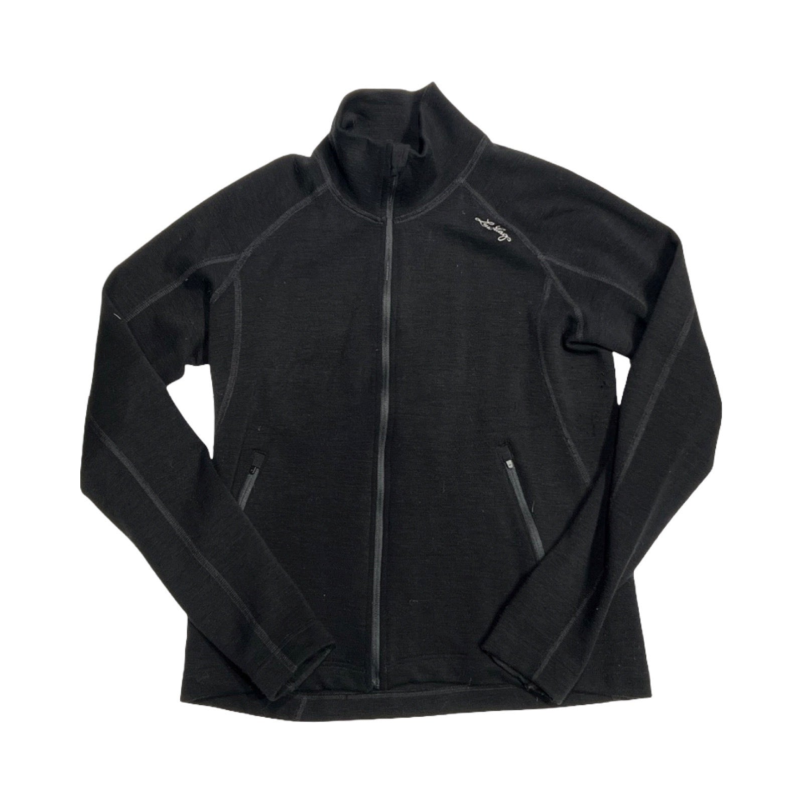 Lundhags Merino Full Zip funktionströja för dam i svart. Tröjan har en hög krage och heldragen dragkedja och är fotograferad platt mot en vit bakgrund.