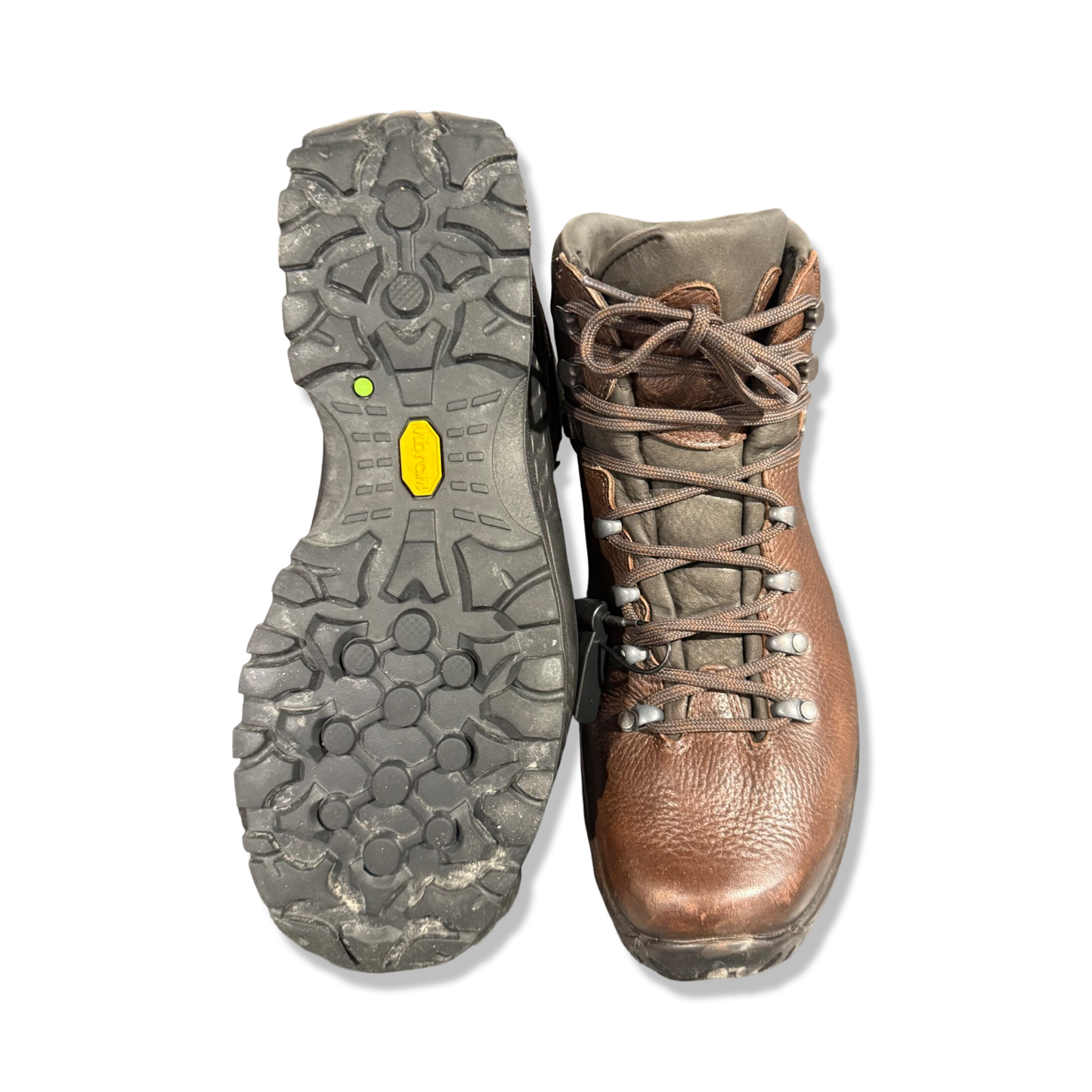 Ett par Hanwag Waxenstein Bio kängor för herr i brunt, där ena kängan visas uppifrån och den andra visar sulan, fotograferade platt mot en vit bakgrund.