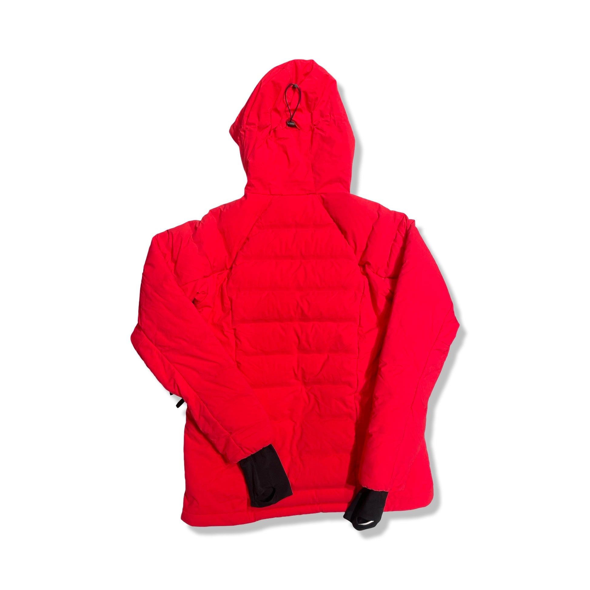 Baksidan av Peak Performance Shielder skidjacka för herr i rött.