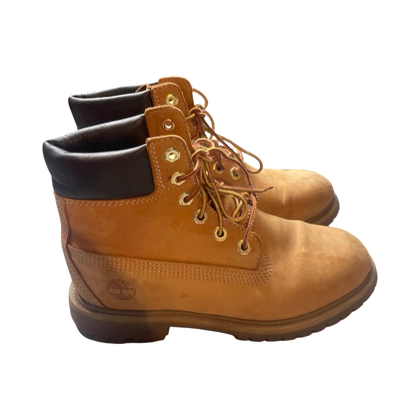 Timberland Original kängor för dam i beige nubuck, fotograferade från sidan mot en vit bakgrund.