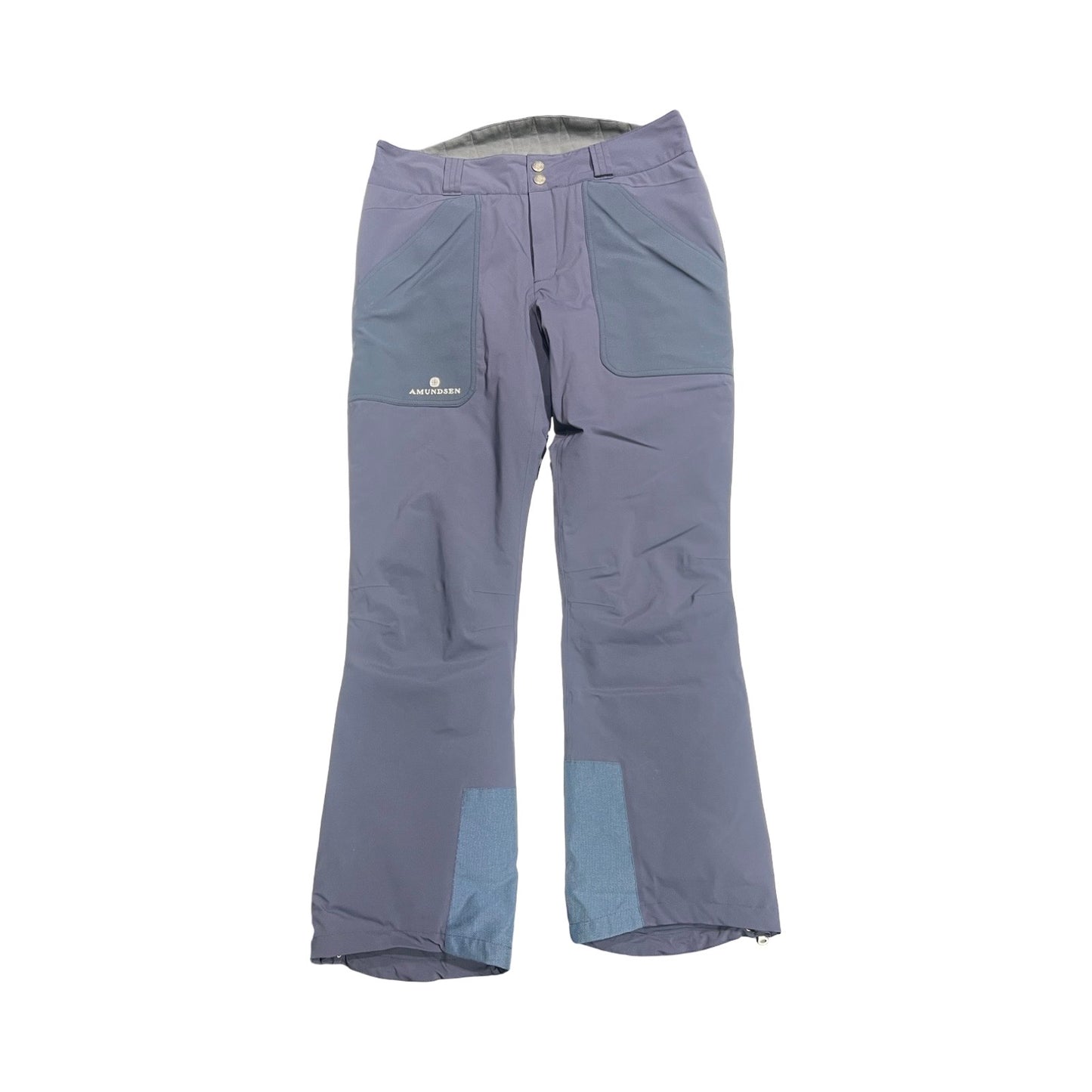 Amundsen skidbyxa för herr i blått. Byxorna har fickor på låren och förstärkta benslut och är fotograferad platt mot en vit bakgrund.