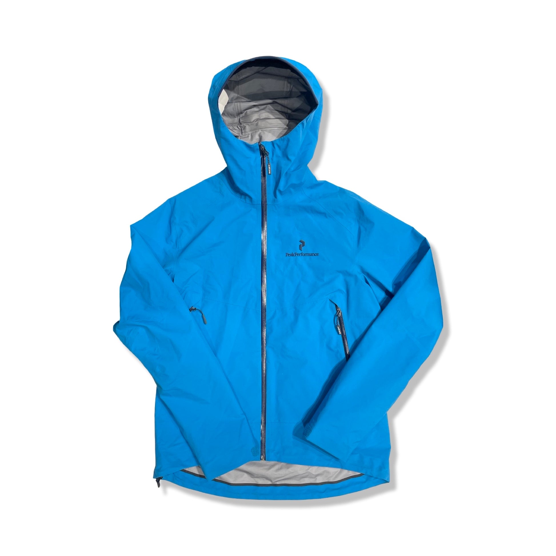 Peak Performance Blacklight skaljacka för herr i blått, fotograferad framifrån mot en vit bakgrund.