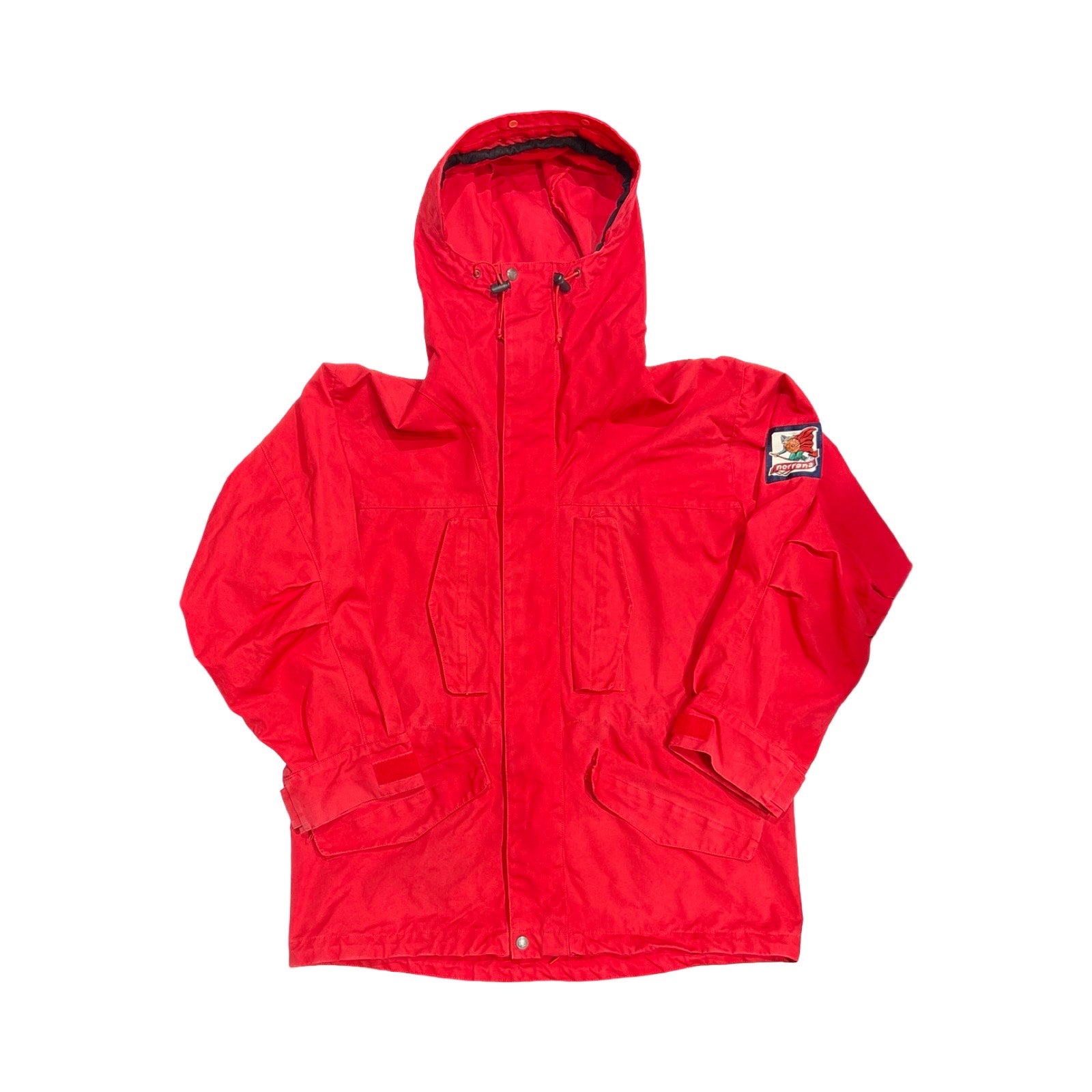 Norröna Arktis Anojakke funktionsjacka för dam i rött, fotograferad framifrån mot en vit bakgrund.