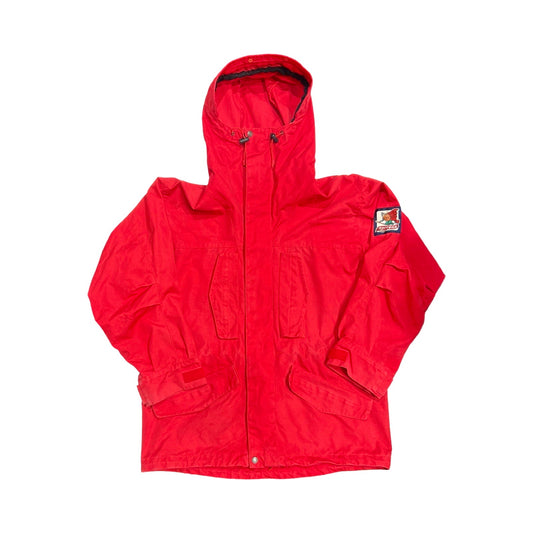 Norröna Arktis Anojakke funktionsjacka för dam i rött, fotograferad framifrån mot en vit bakgrund.