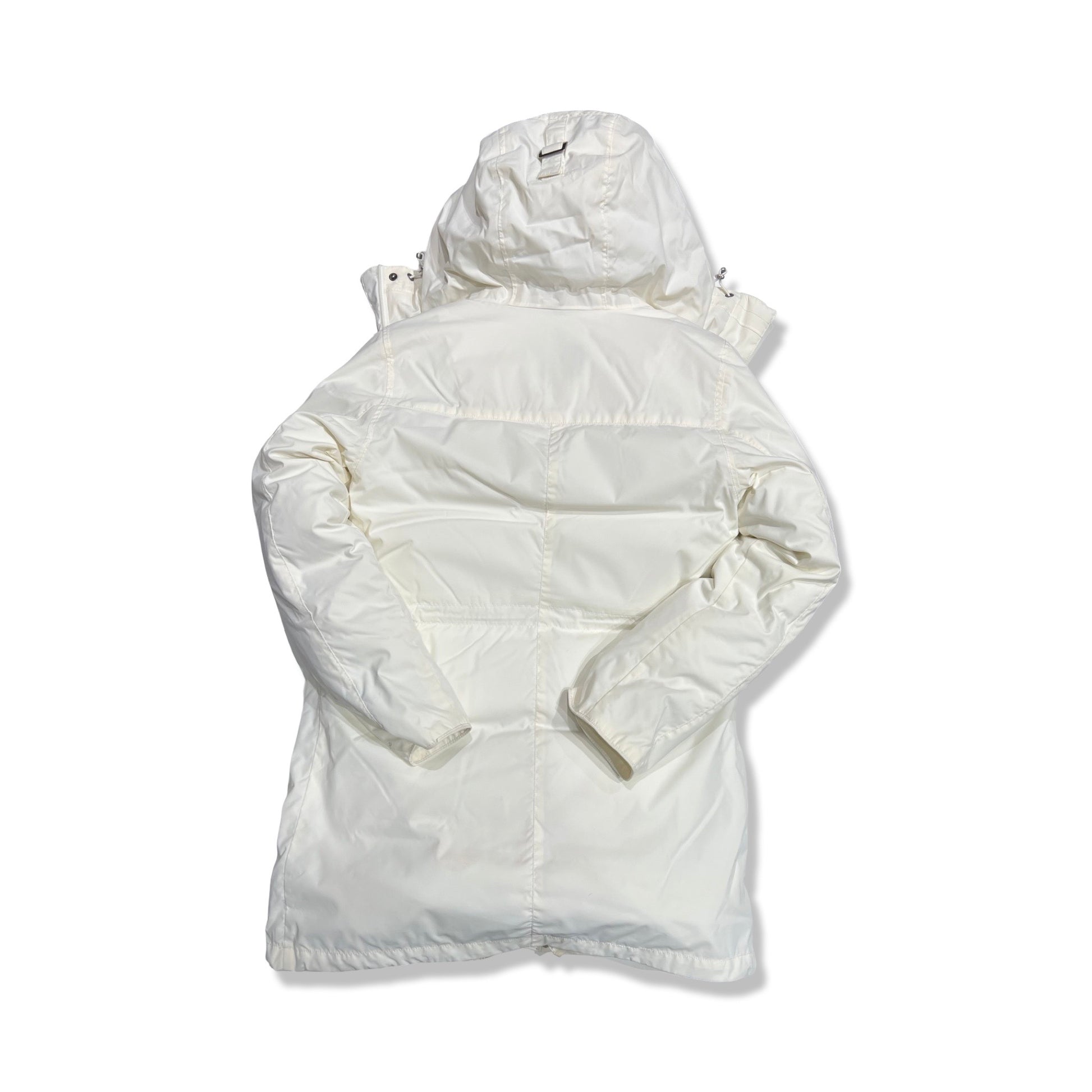 Baksidan av Peak Performance Peak parkas för dam i vitt.