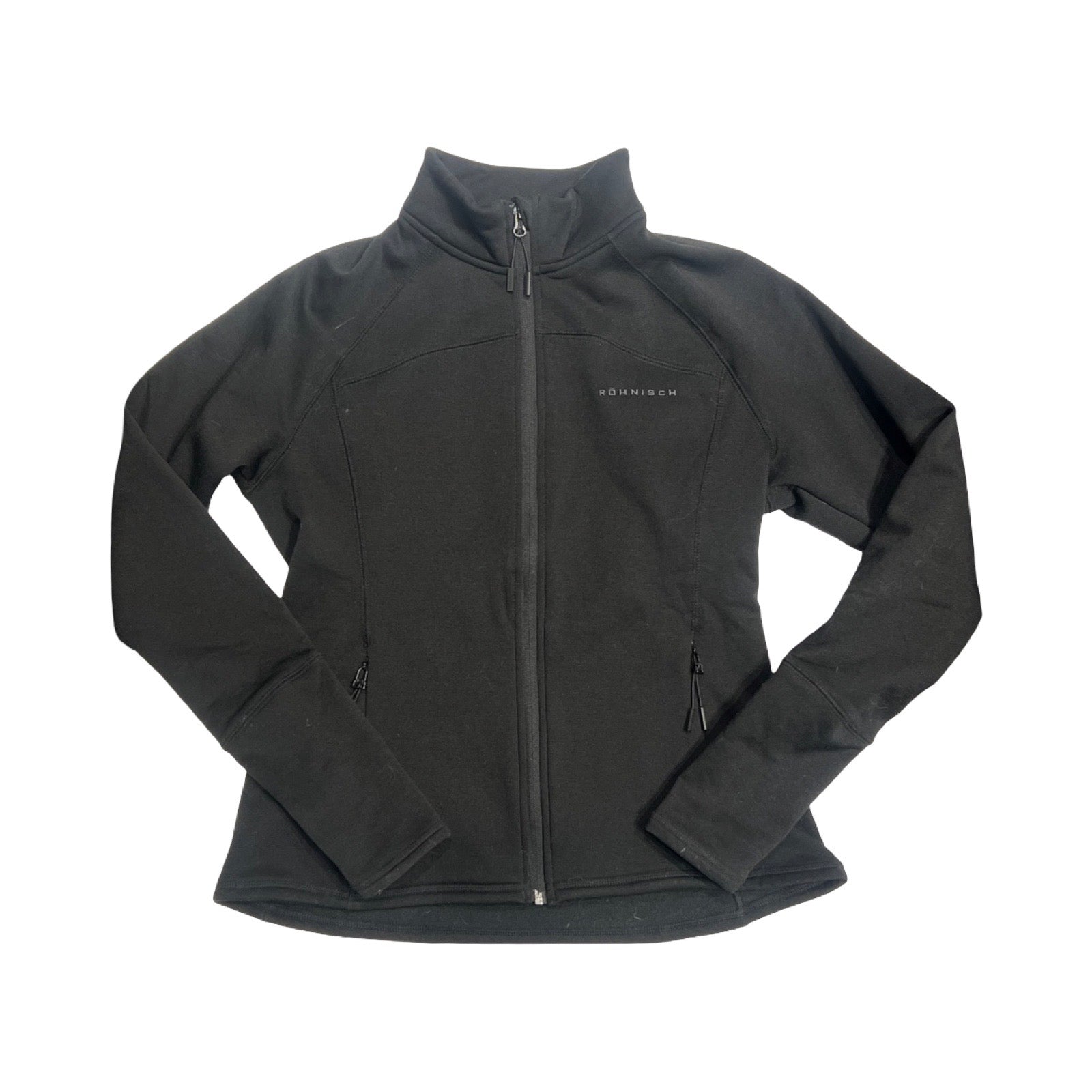 Röhnisch Sabell fleecejacka för dam. Jackan är stretchig och har en hel dragkedja fram, handfickor med dragkedjor och tumgrepp. Den är fotograferad platt mot en vit bakgrund.