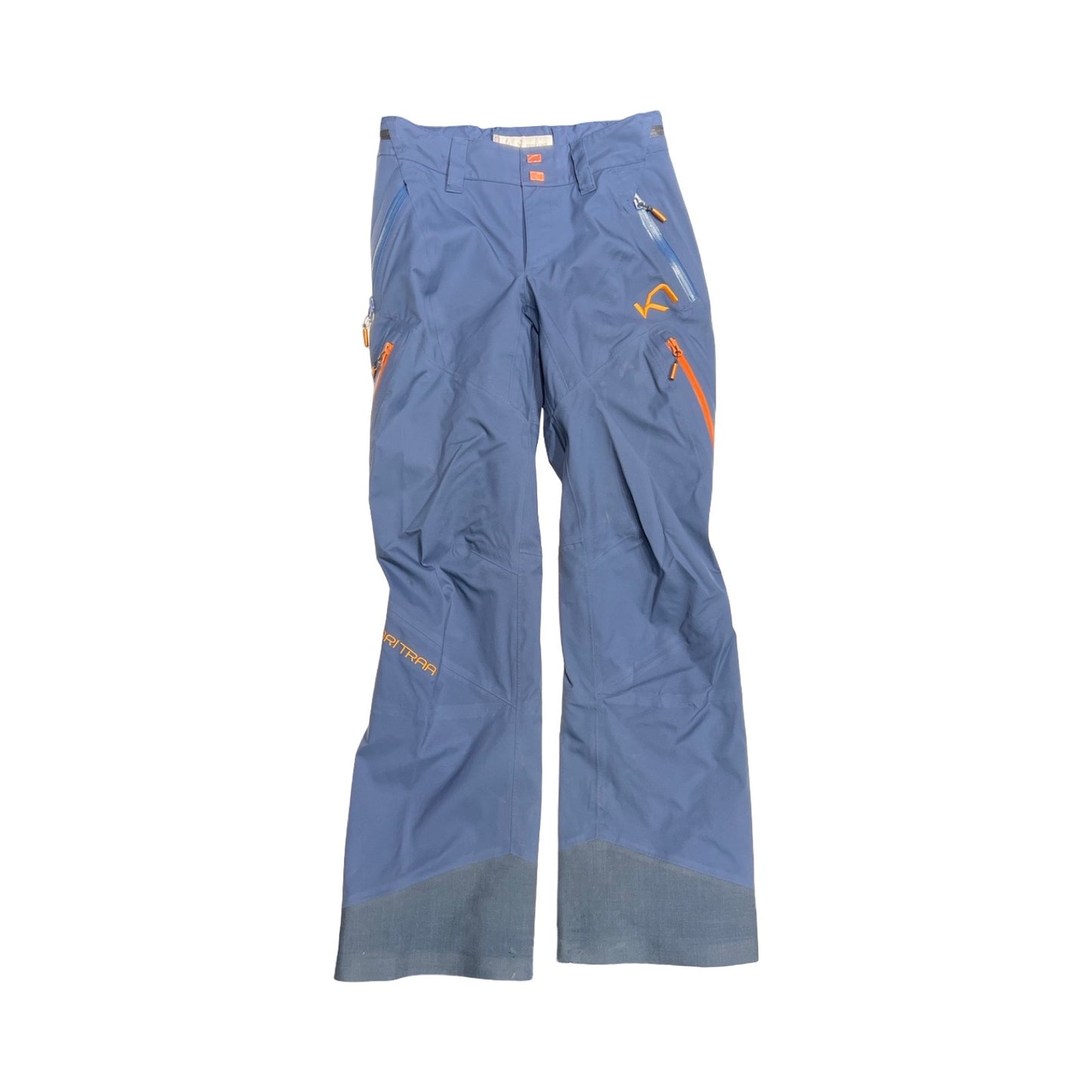 Kari Traa Voss Line Backflip skalbyxa för dam i blått med orangea dragkedjor, fotograferad framifrån mot en vit bakgrund.