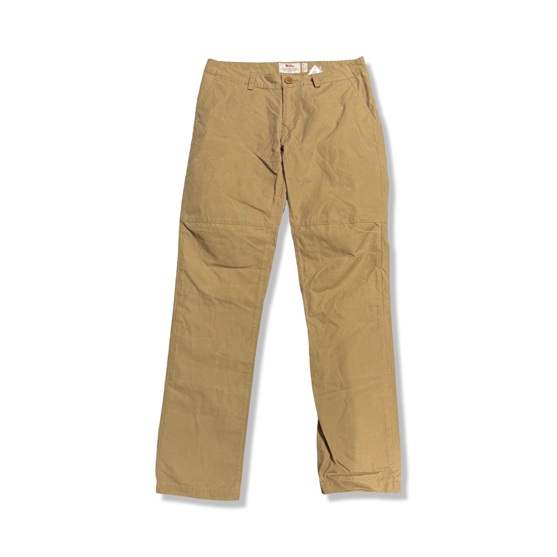 Fjällräven vandringsbyxa för dam i beige, fotograferad framifrån mot en vit bakgrund.